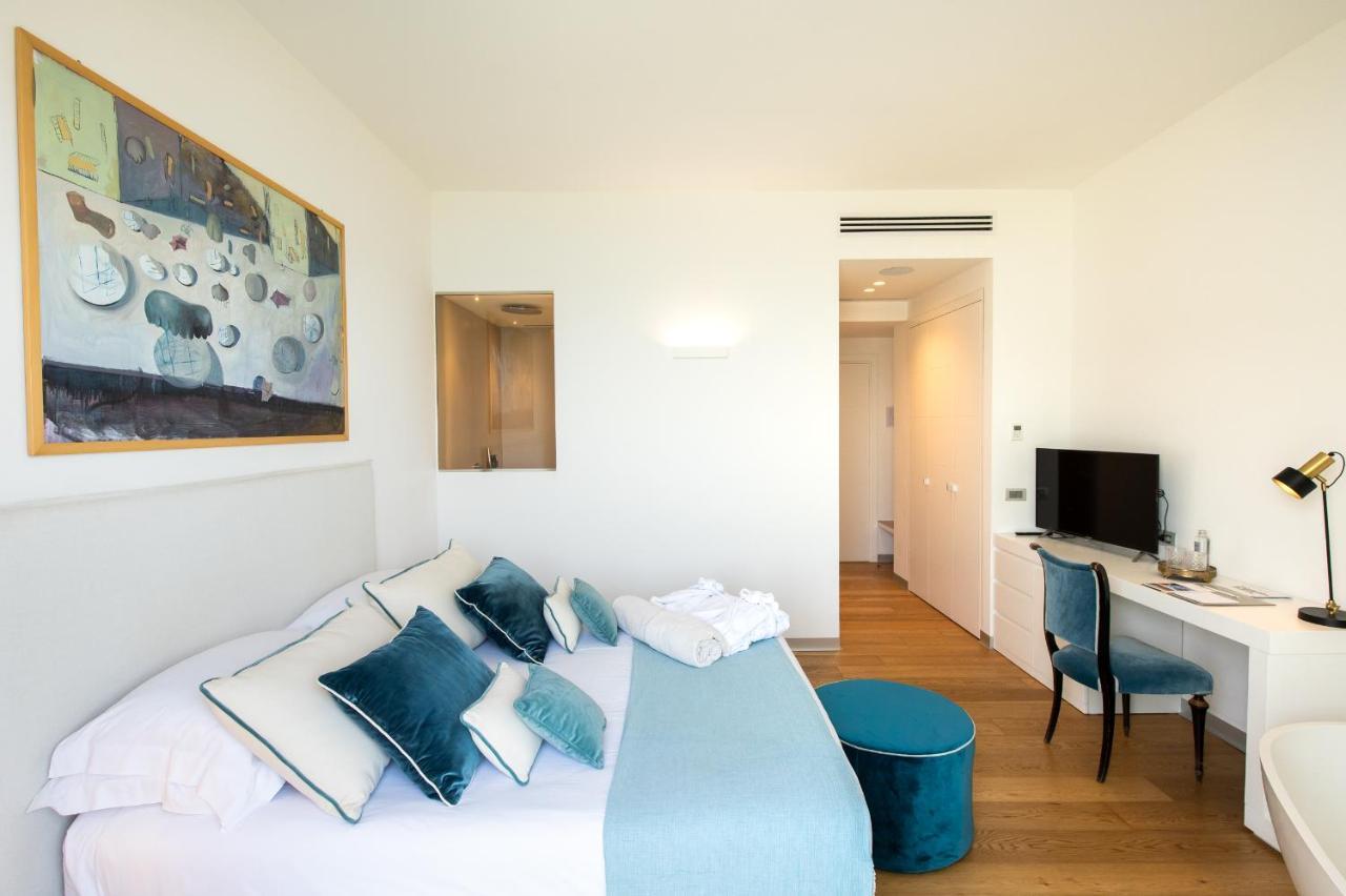Unico Boutique Hotel D'Arte Монделло Экстерьер фото